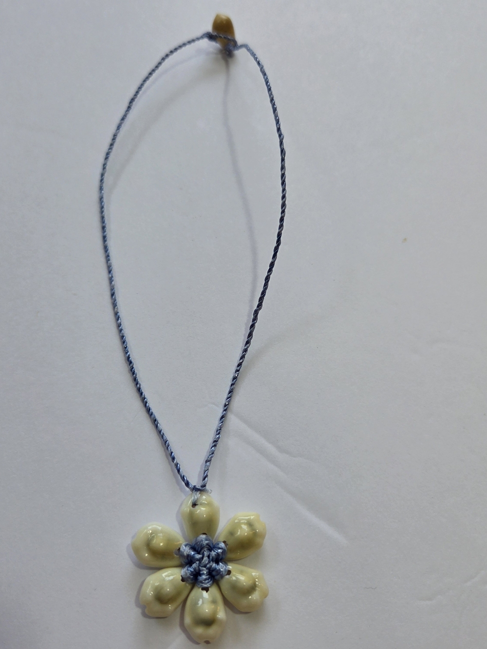 Handcrafted Cream Flower Pendant Necklace with Blue Cord